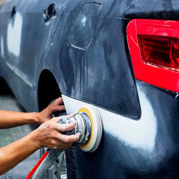 Sanding and buffing car dings and scratches before painting at Touba Collision Center & Auto Body Shop in Reading